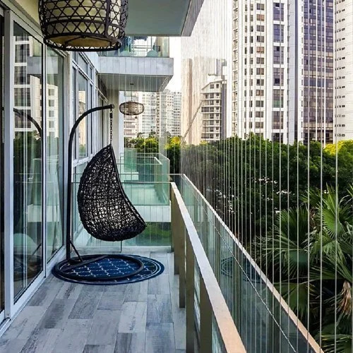 Invisible balcony grill installation by Christi Enterprises
